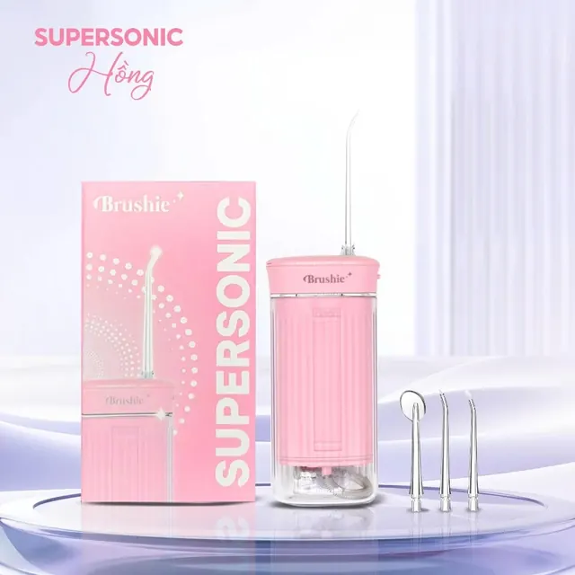 Máy tăm nước gấp gọn Brushie Super Sonic màu hồng bên hộp sản phẩm (ảnh minh họa)